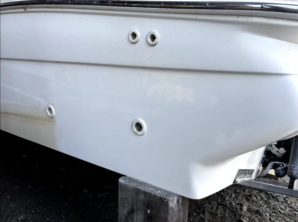 Cleaned white boat hull after detailing, showing a spotless finish and restored gel coat by True North Detailing Muskoka.